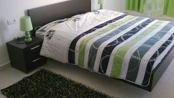 Comfort Apartment | Individually furnished, blackout drapes, bed sheets