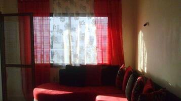 Comfort Apartment | Living area | Plasma TV