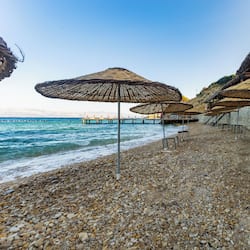 Private beach, free beach shuttle, sun loungers, beach umbrellas
