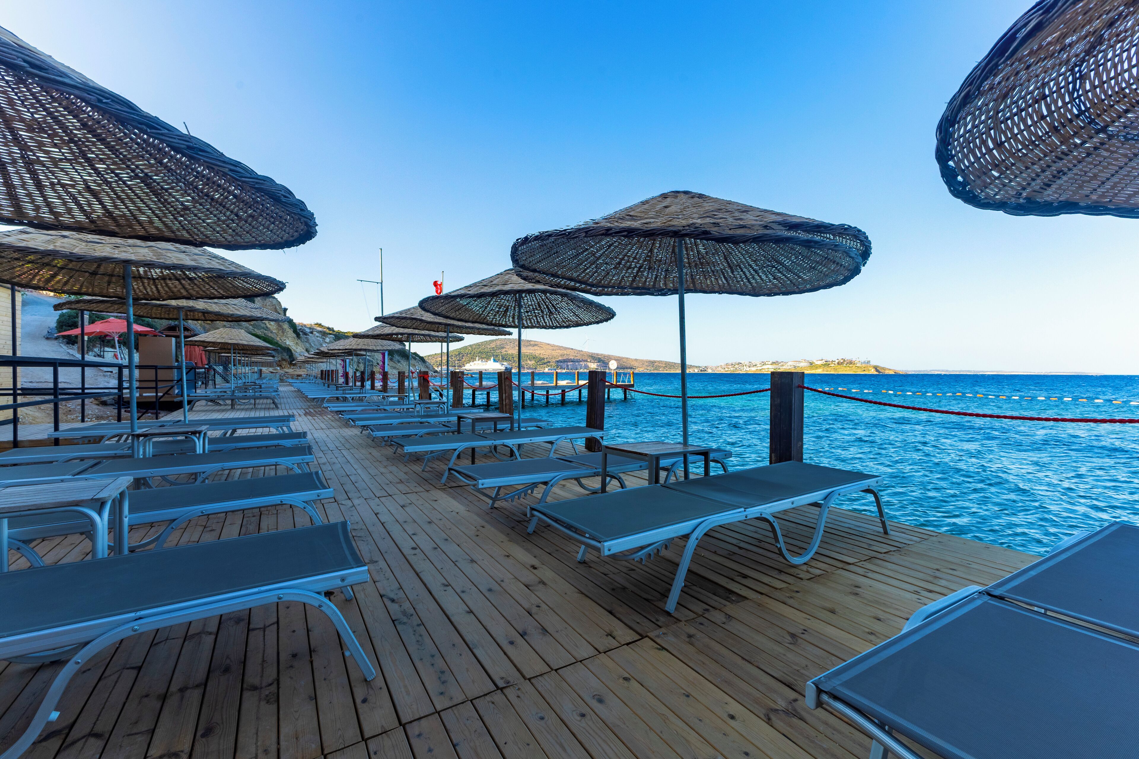 private beach, free beach shuttle, sun-loungers, beach umbrellas