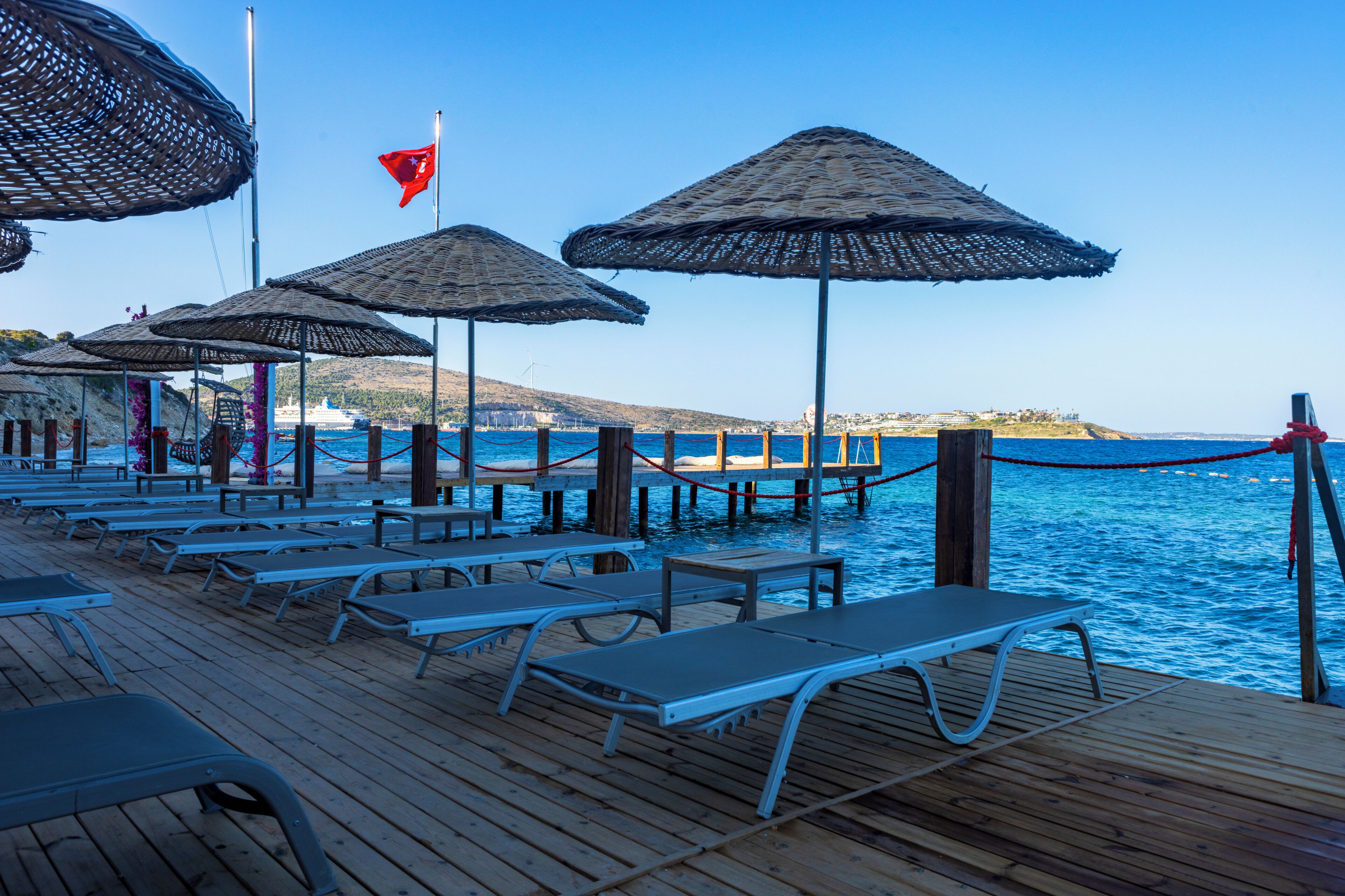 private beach, free beach shuttle, sun-loungers, beach umbrellas