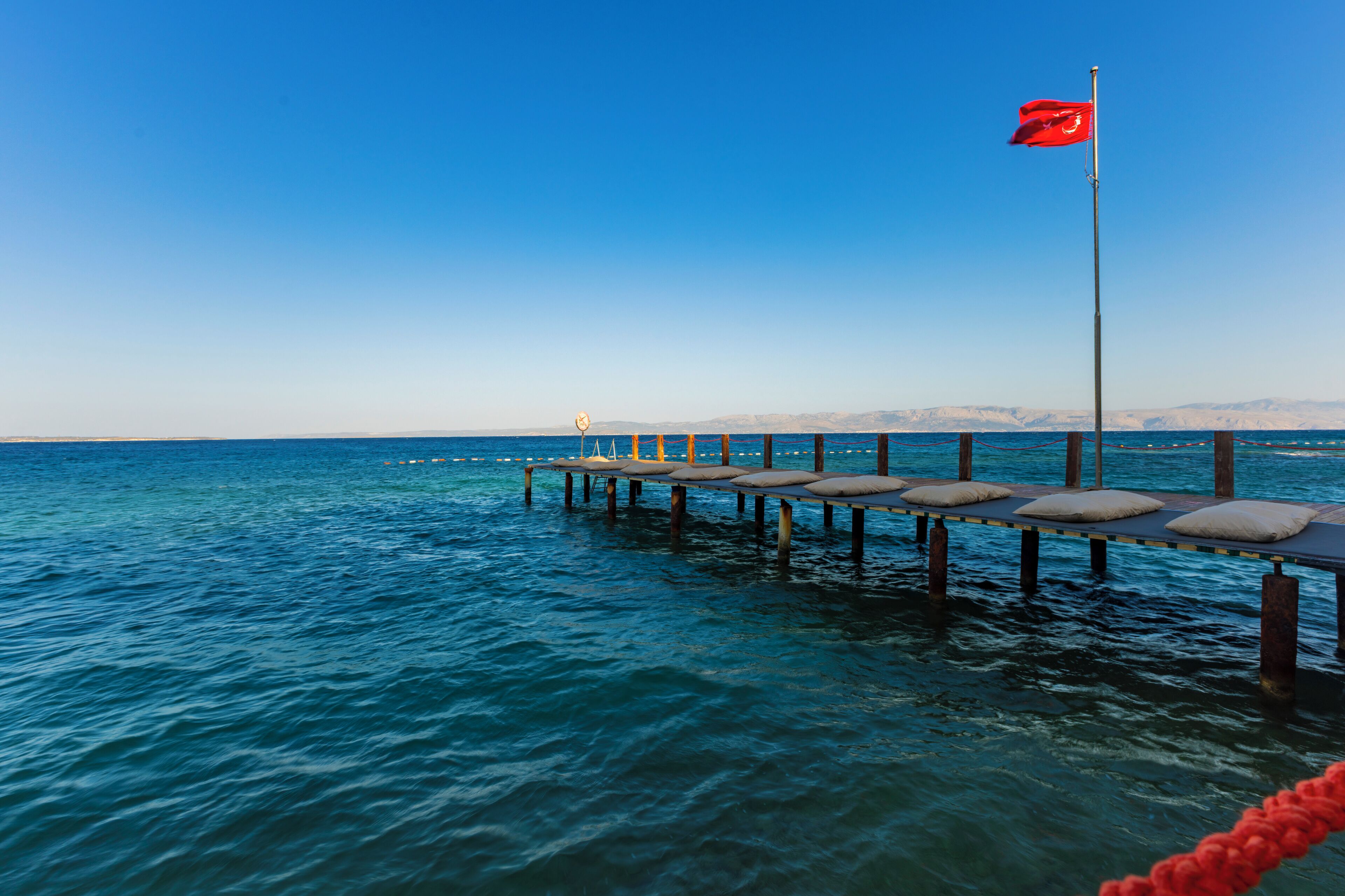 private beach, free beach shuttle, sun-loungers, beach umbrellas