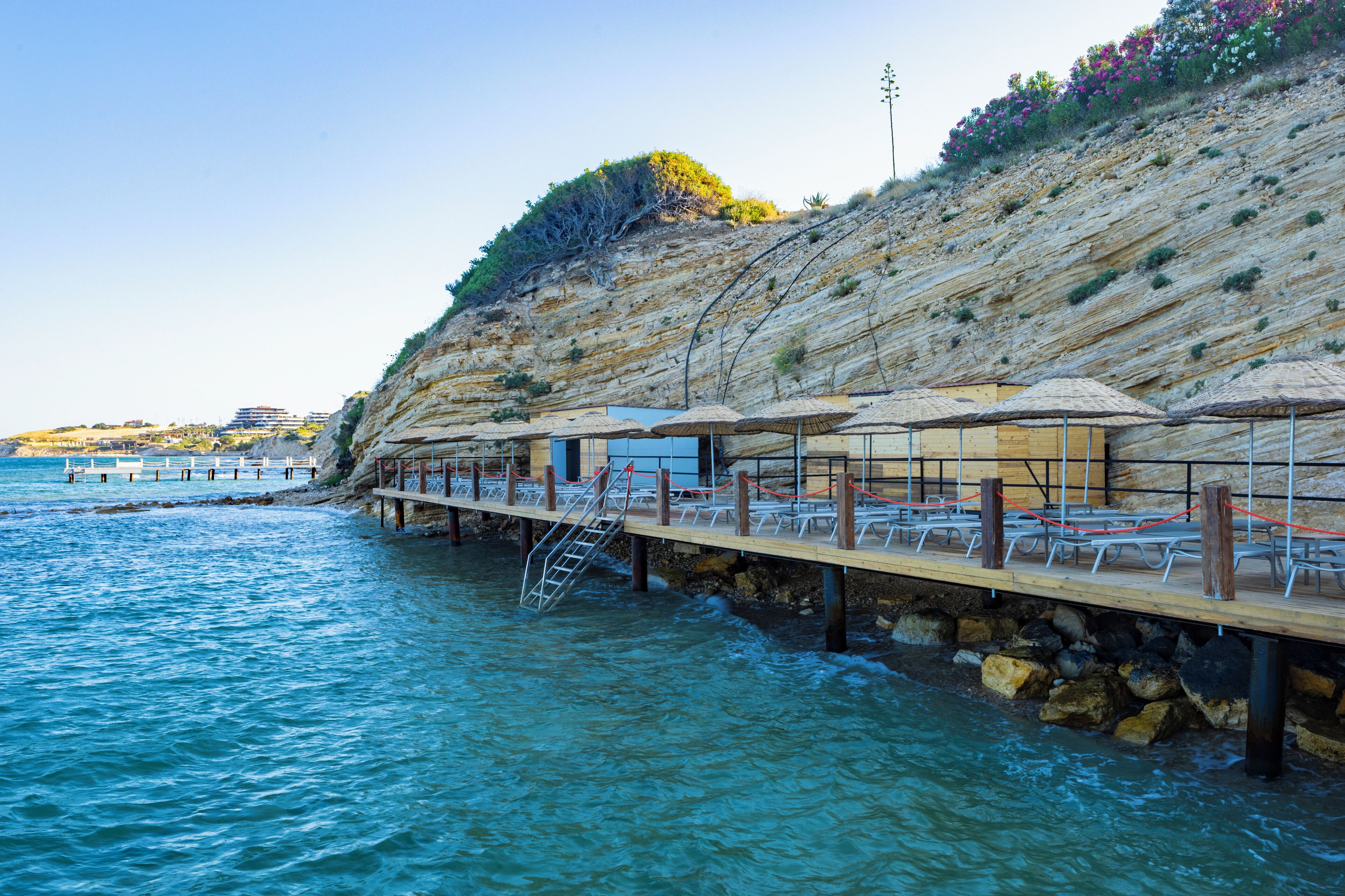 private beach, free beach shuttle, sun-loungers, beach umbrellas