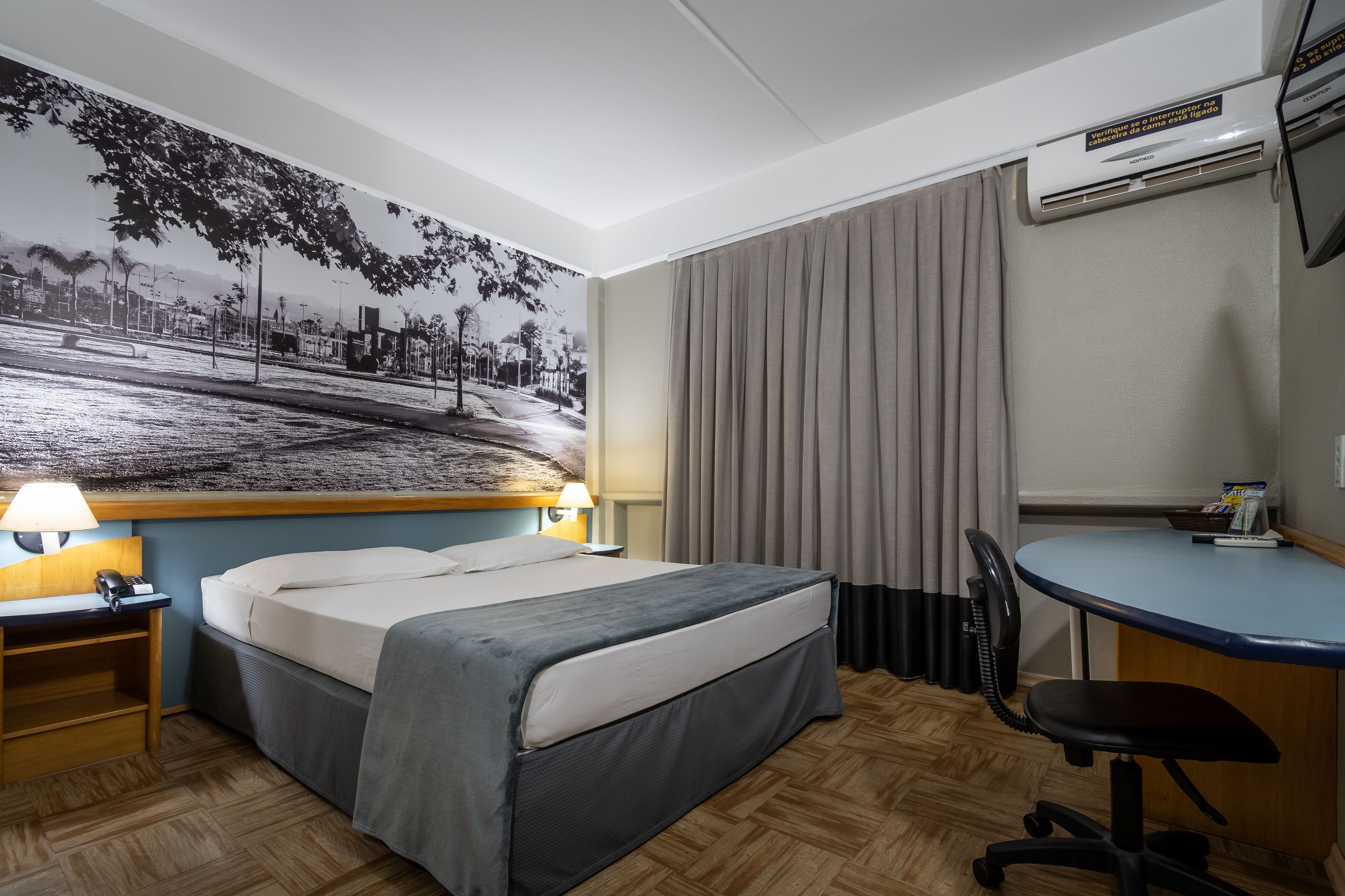 deluxe double room | minibar, in-room safe, desk, blackout curtains