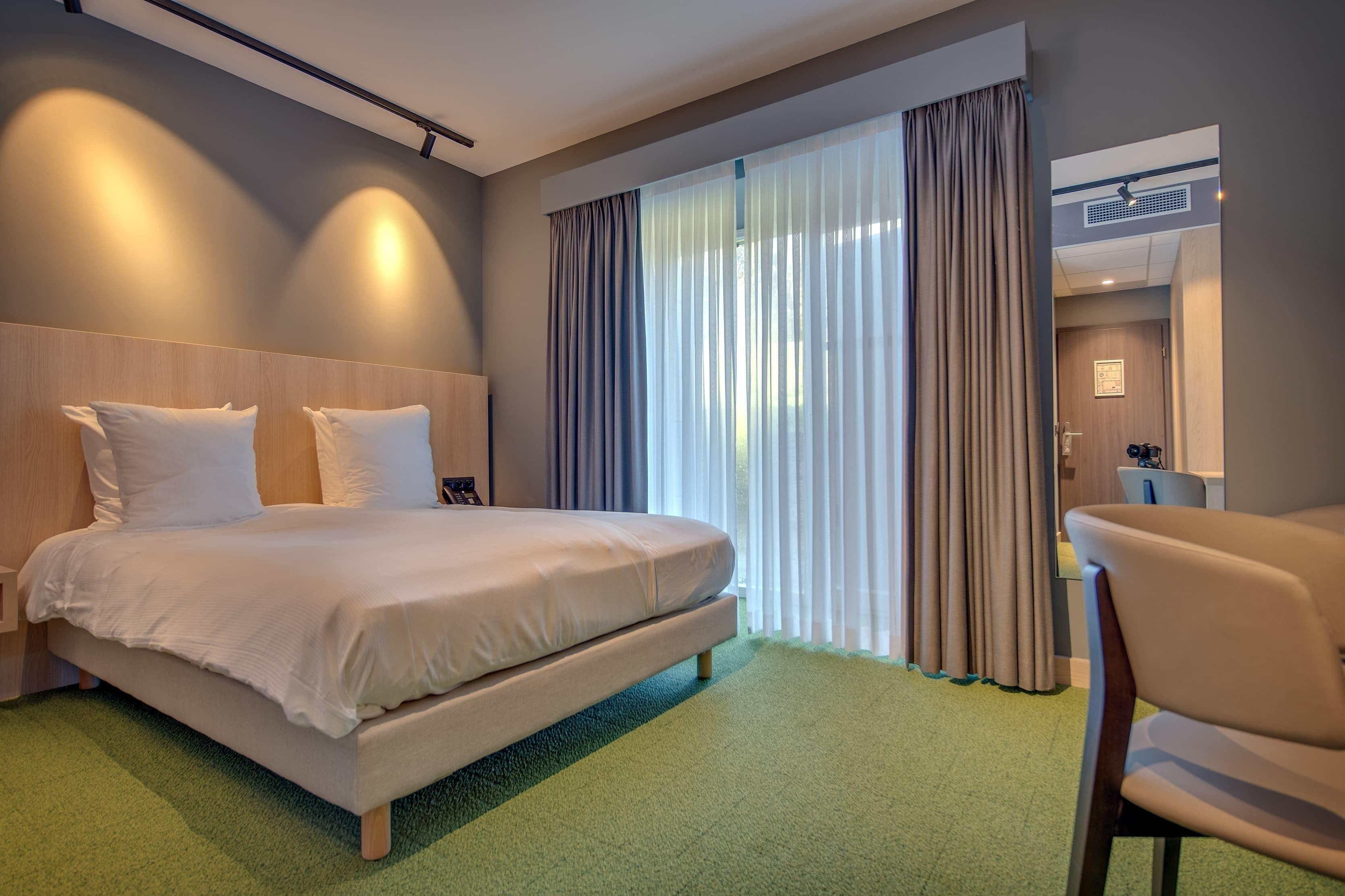 superior double or twin room, golf view | 1 bedroom, minibar, in-room safe, desk