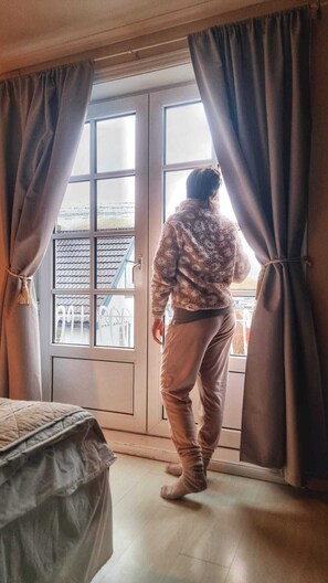Budget Room | Individually decorated, iron/ironing board, free WiFi, bed sheets - visitHOMES Faroe Islands (Leirvik)