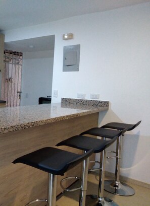 Standard Apartment, 3 Bedrooms, 2 Bathrooms, Ground Floor | Private kitchen | Fridge, microwave, stovetop, cookware/dishes/utensils - Lion House Medellin (Medellín)