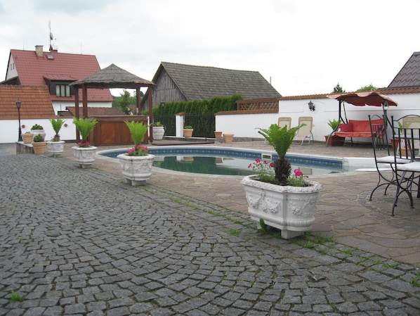 Outdoor pool, pool umbrellas, pool loungers