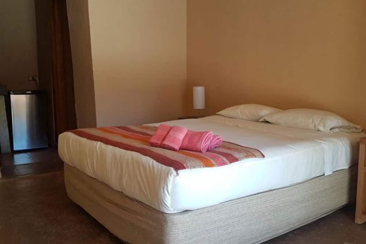 Bungalow, 1 Queen Bed | 1 bedroom, free cots/infant beds
