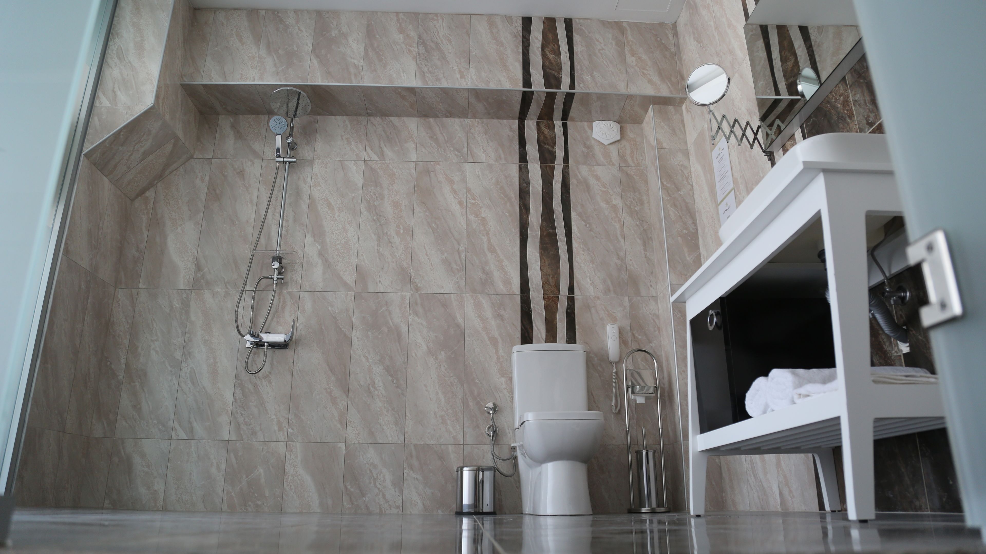 deluxe room | bathroom | shower, free toiletries, hair dryer, slippers