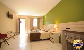 Quarto triplo standard | Frigobar, cofres nos quartos, cortinas blackout, berços grátis
