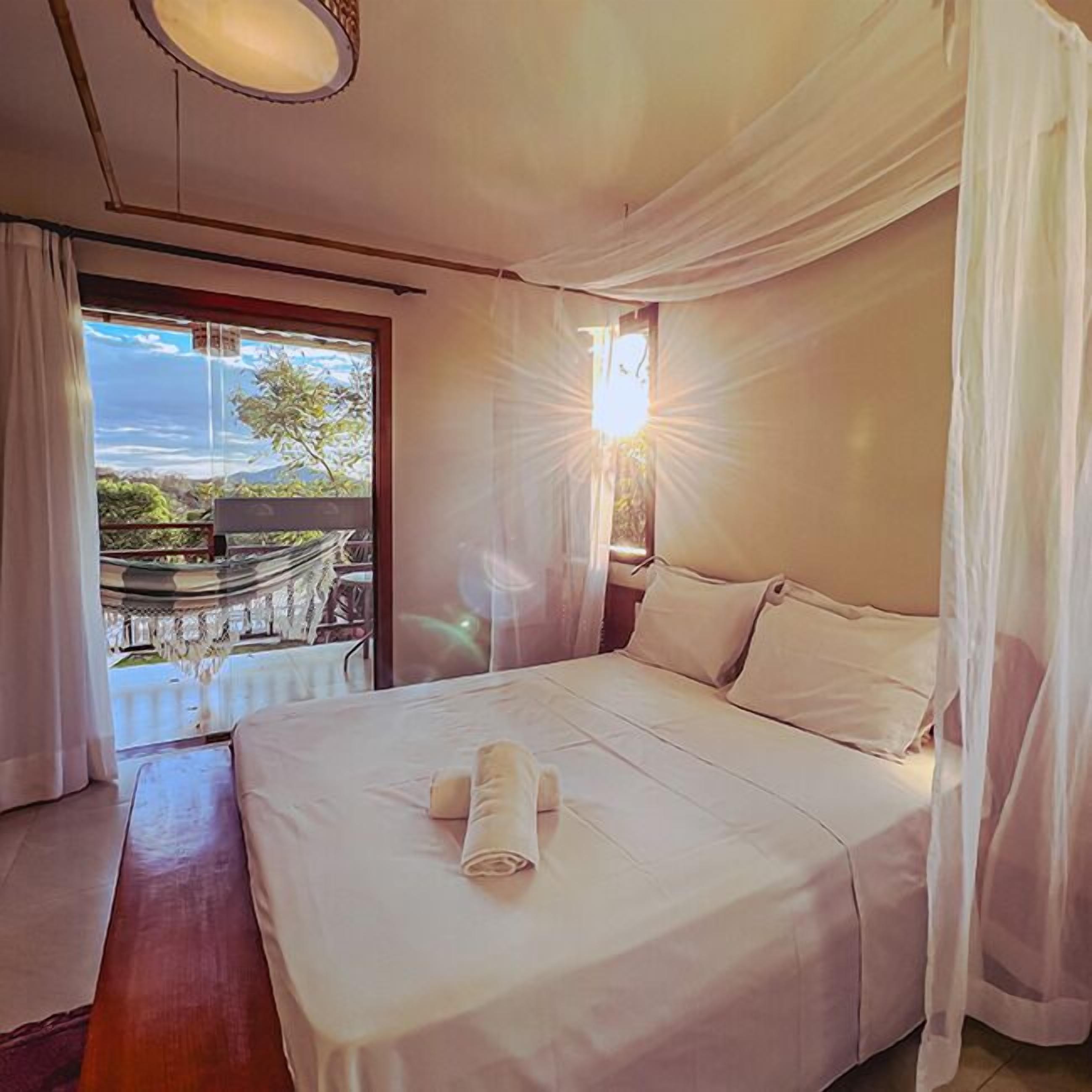 Quarto superior | Frigobar, Wi-Fi de cortesia, roupa de cama