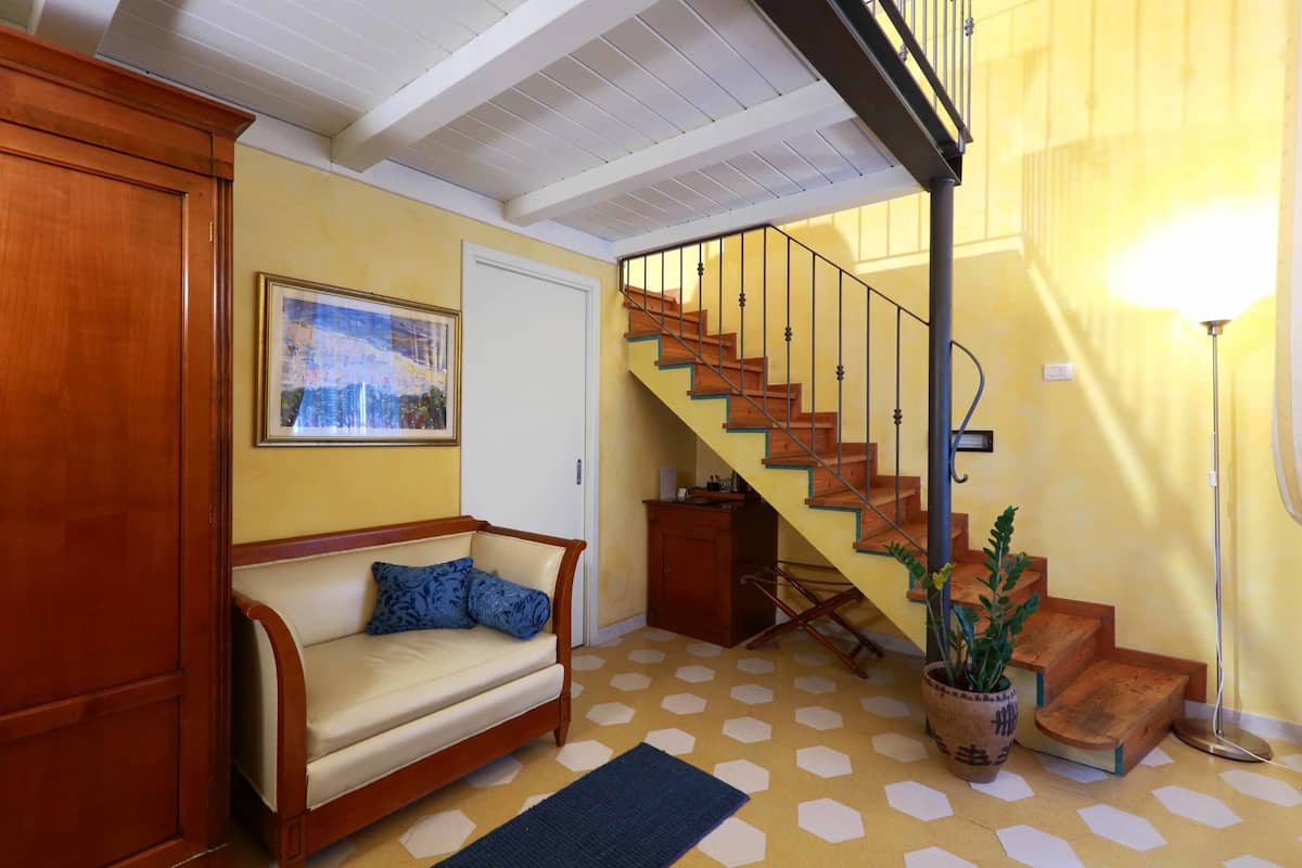 Superior Room | Minibar, in-room safe, individually decorated, individually furnished