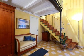 Superior Room | Minibar, in-room safe, individually decorated, individually furnished