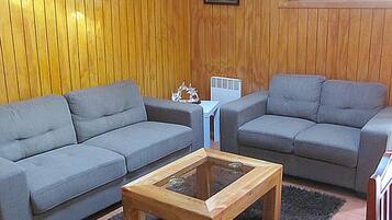 Standard Apartment, 1 Bedroom | Living area | 32-inch LCD TV with cable channels, TV