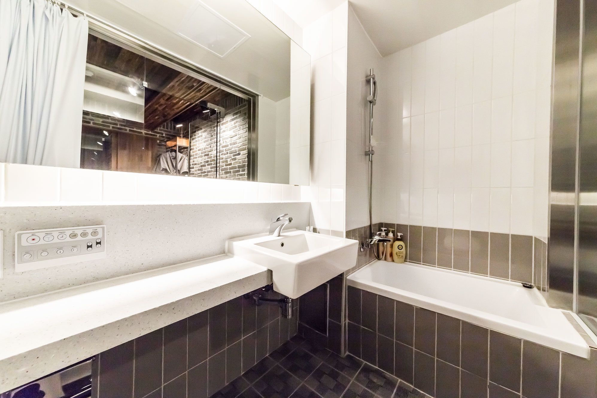 combined shower/bathtub, free toiletries, hair dryer, bathrobes