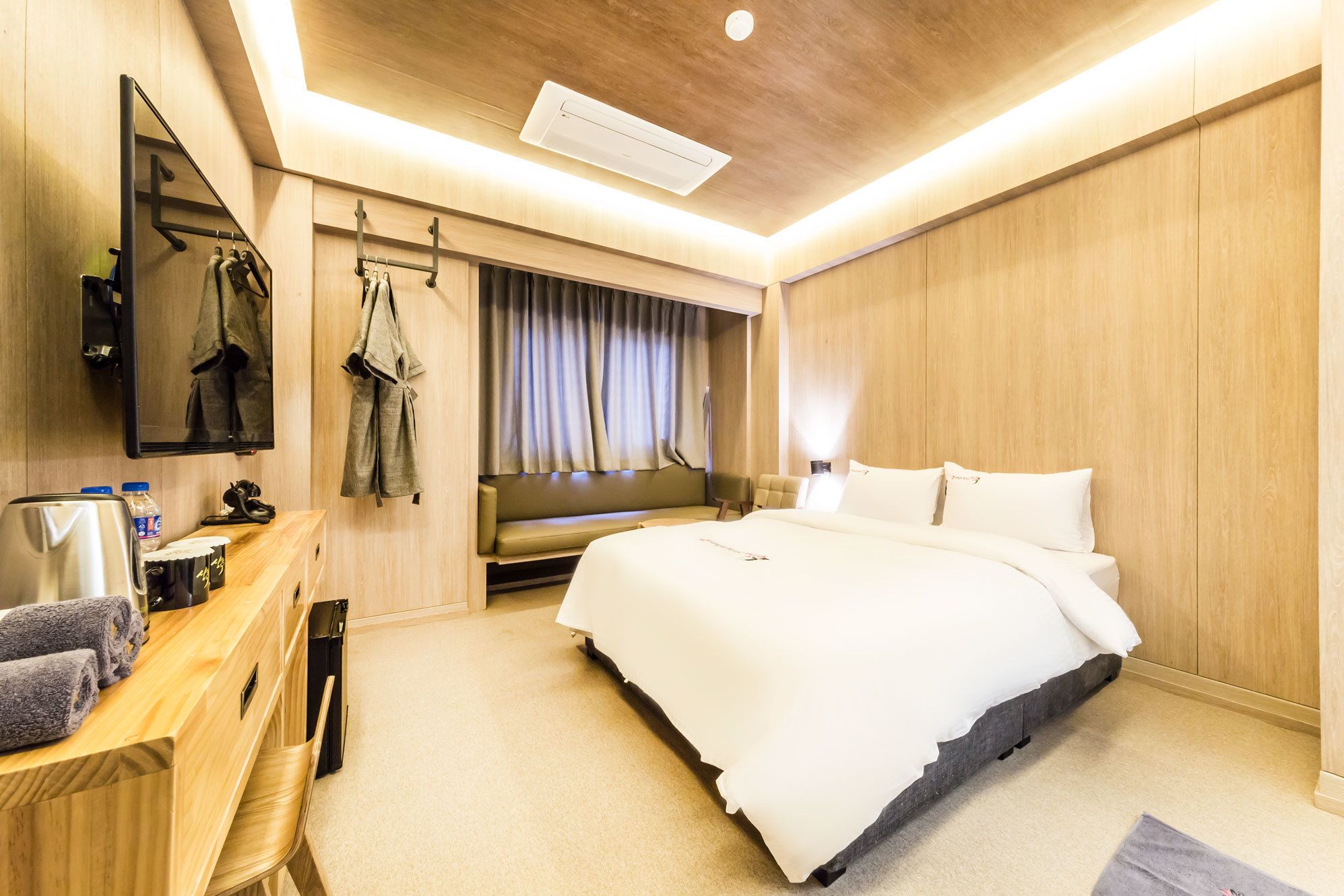 hypo-allergenic bedding, down duvets, memory-foam beds, in-room safe