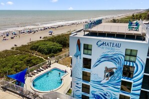 A heated pool - Oceanfront Condo In TOP Location. On The Beach And Steps To The Pier 🌅 (Cocoa Beach)