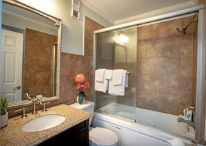 Combined shower/bathtub, jetted bath, hair dryer, towels