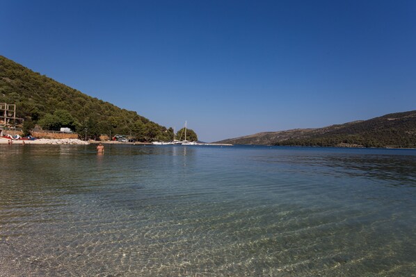 On the beach, sun-loungers, beach towels