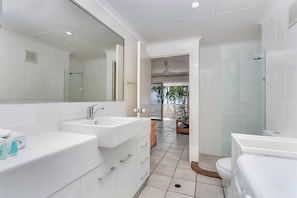 Shower, hair dryer, towels