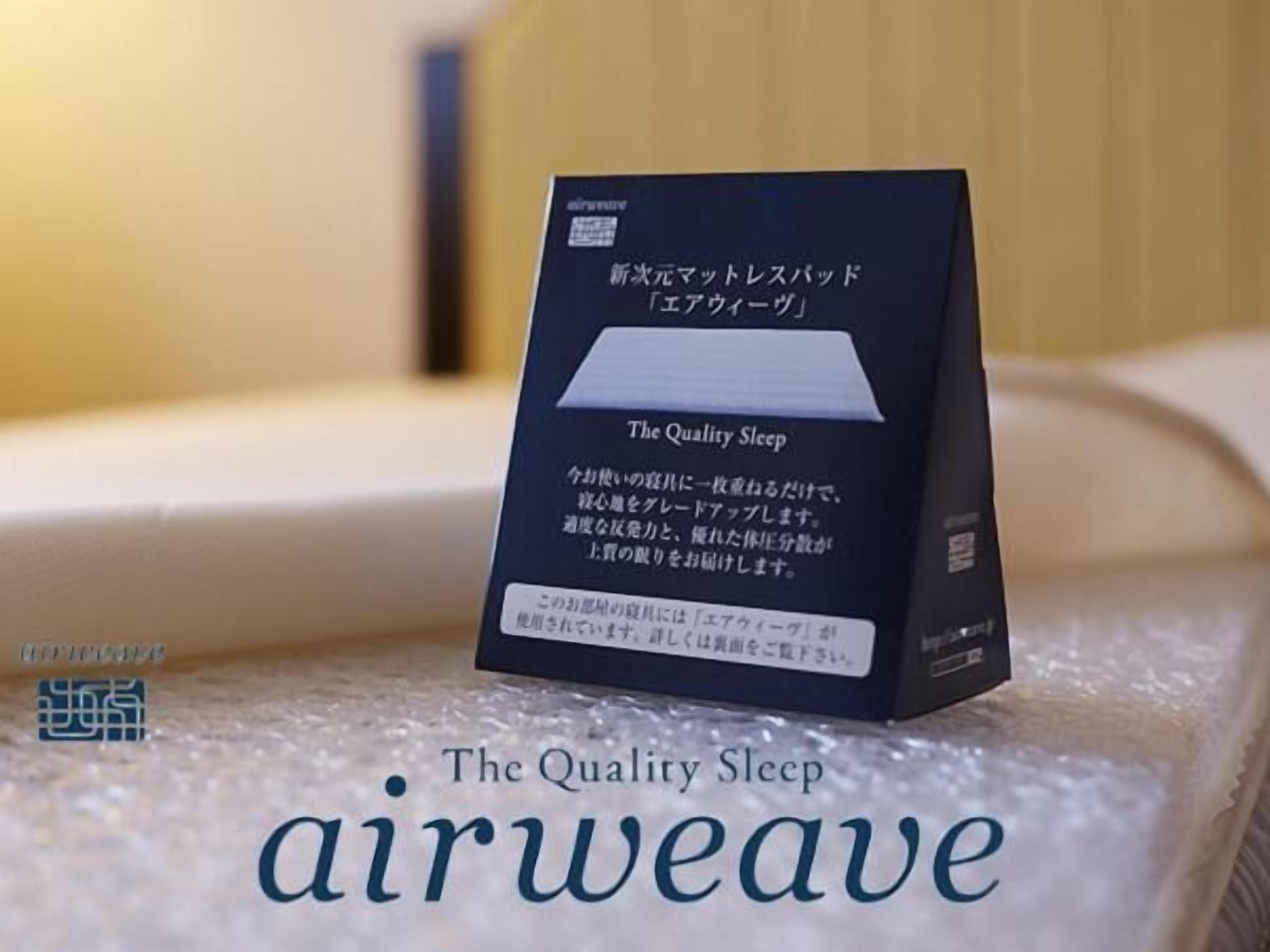 combined shower/bathtub, free toiletries, hair dryer, slippers