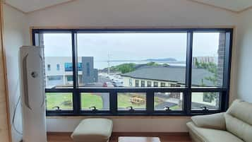 Family Condo, 2 Bedrooms, Non Smoking, Ocean View | Living area | Flat-screen TV, heated floors