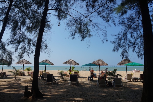 On the beach, sun-loungers, beach towels, beach massages