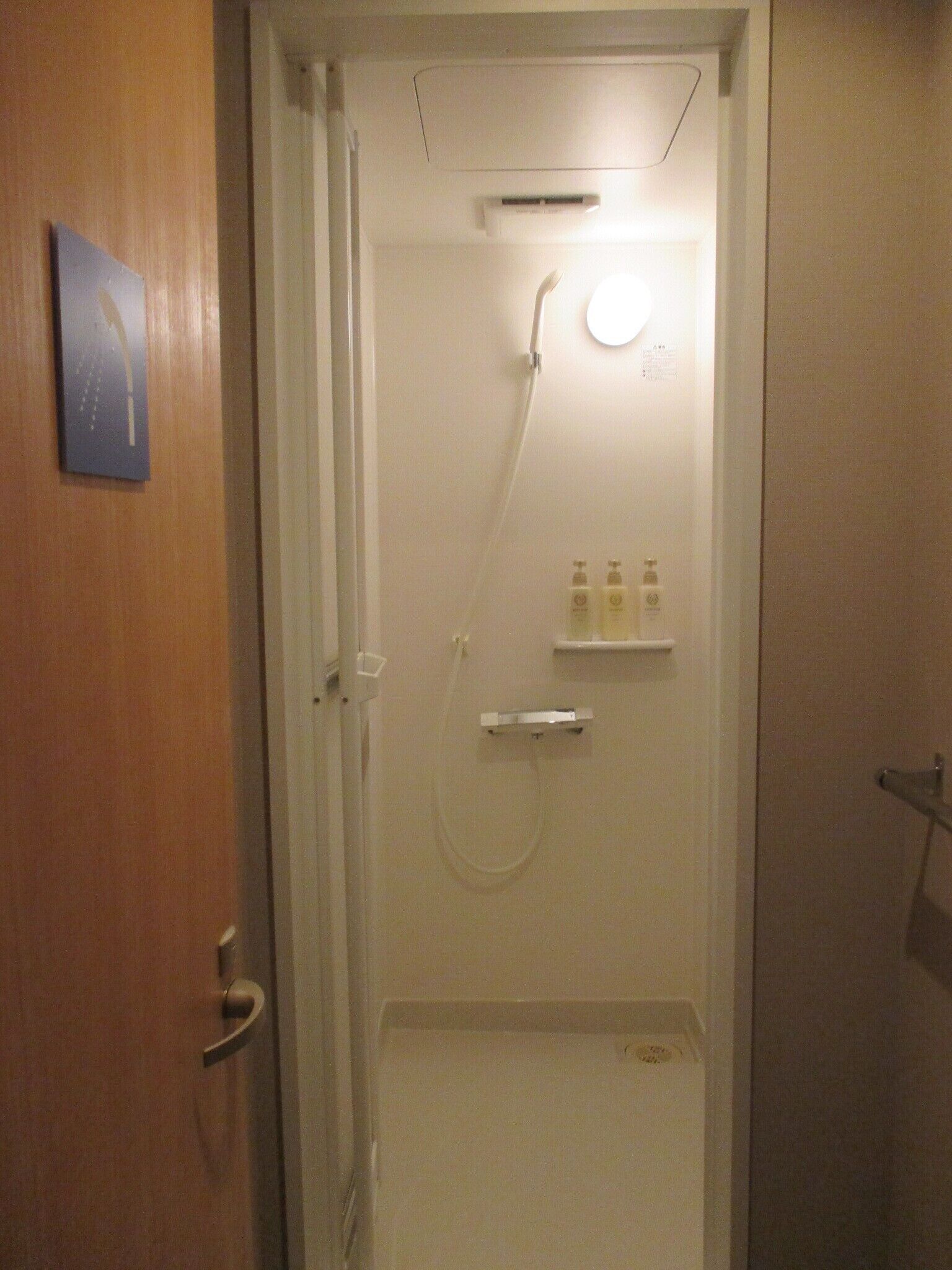 grand single room | bathroom | free toiletries, hair dryer, electronic bidet, towels