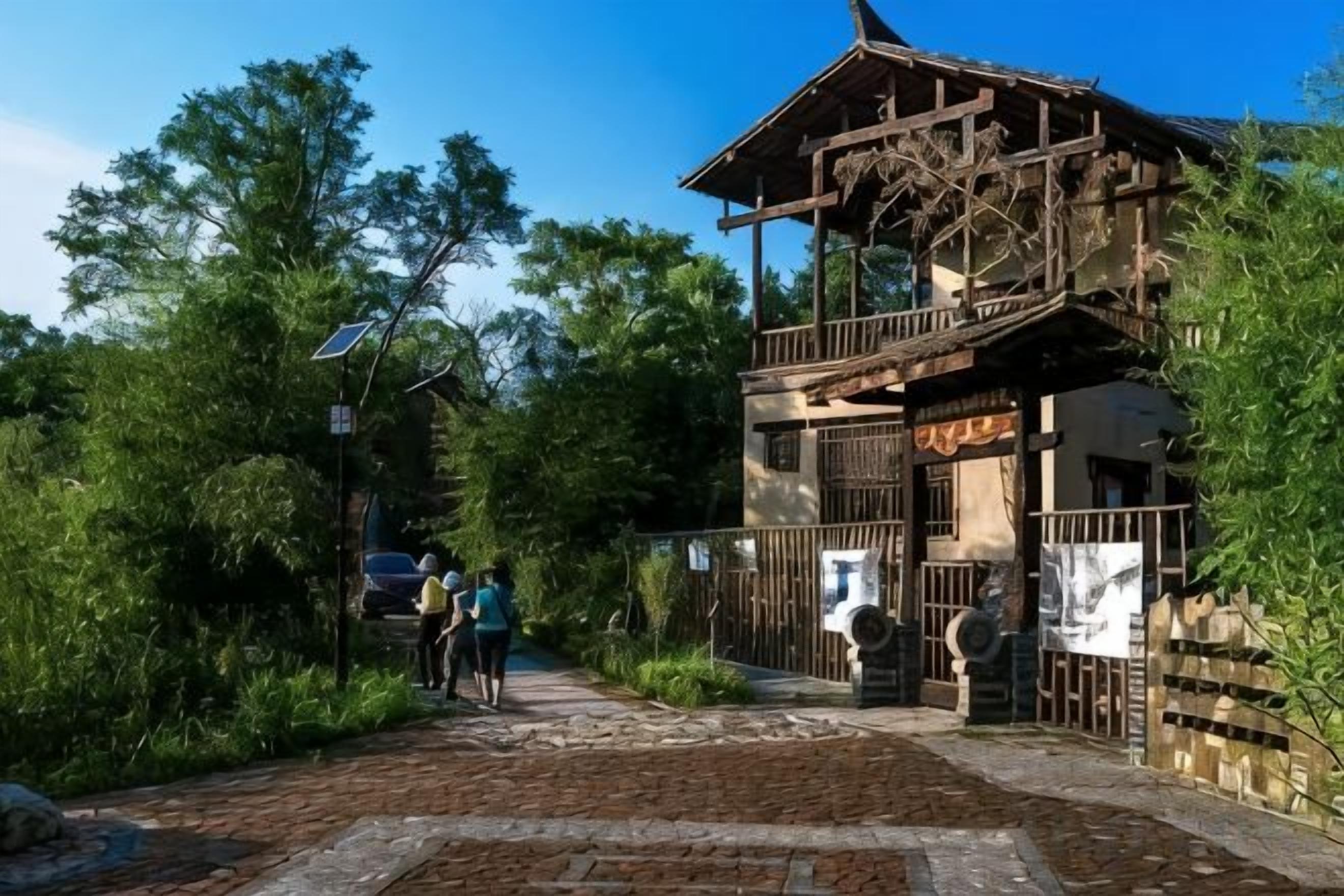 A traditional wooden building with a balcony, surrounded by greenery.