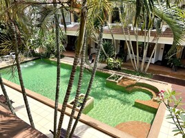 Grand Deluxe Room with Private Terrace | Pool | Outdoor pool, sun loungers