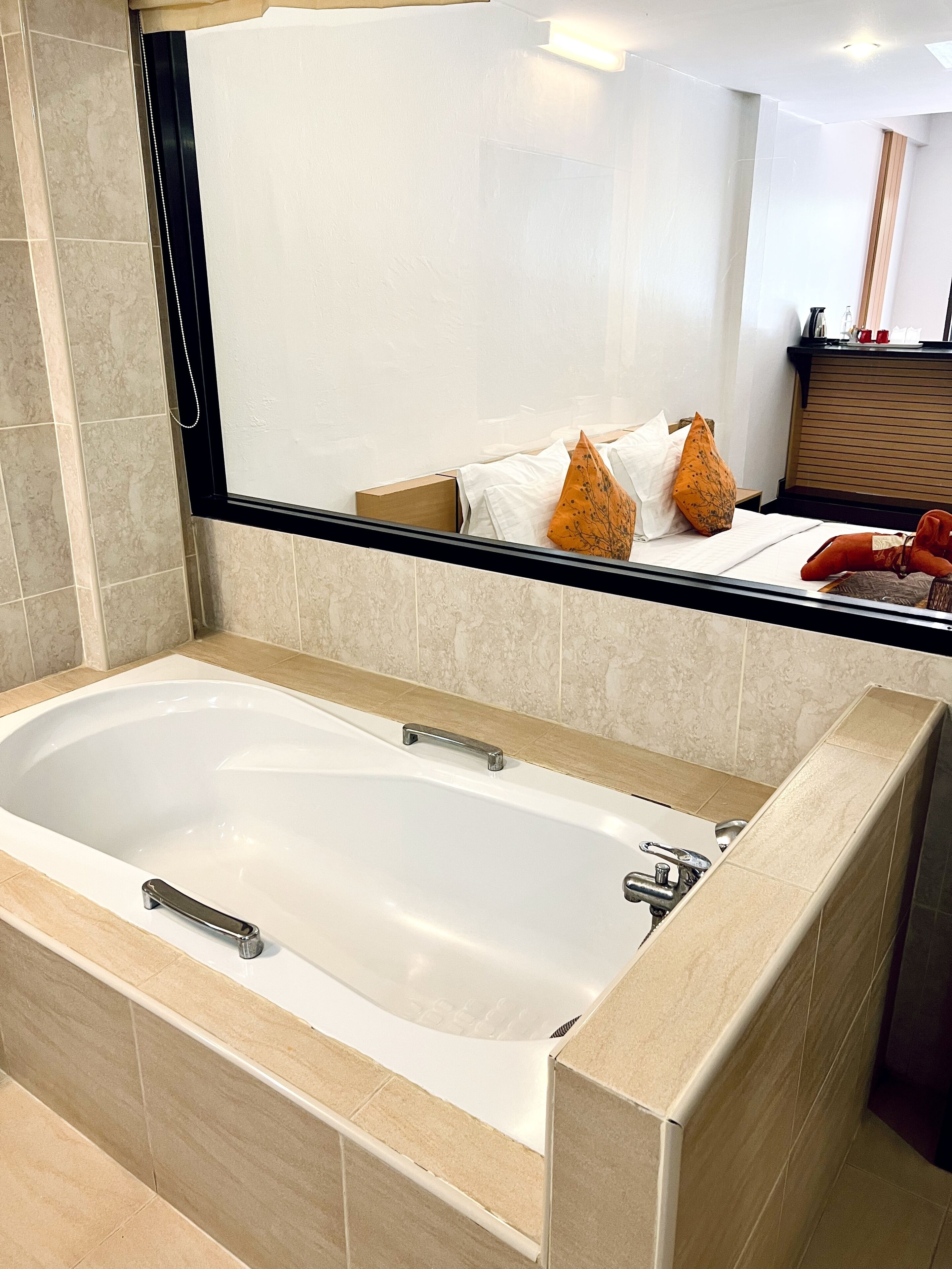 grand deluxe double room with pool view | bathroom | free toiletries, hair dryer, towels