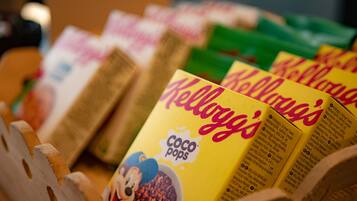 A display of Kellogg's Coco Pops cereal boxes in a store.