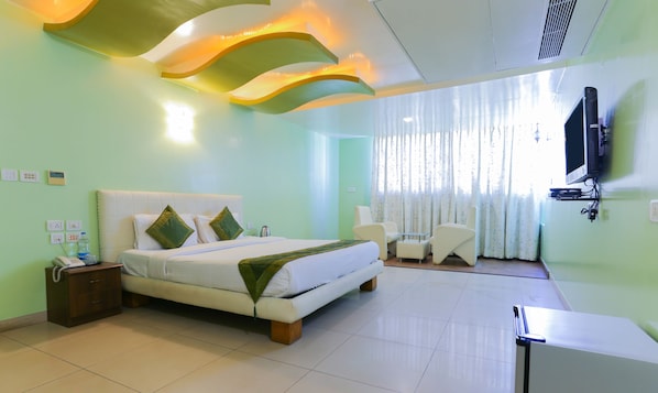 Premium Room | Desk, iron/ironing board, free WiFi - Treebo Trip Cynosure Suites (Bengaluru)