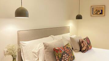 Deluxe Interior Double Room | Desk, blackout drapes, iron/ironing board, free WiFi