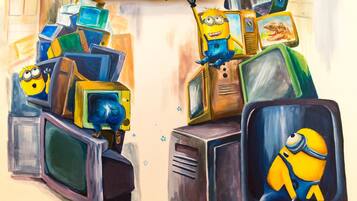 A room with a television on the wall and a Minion character on a TV screen.