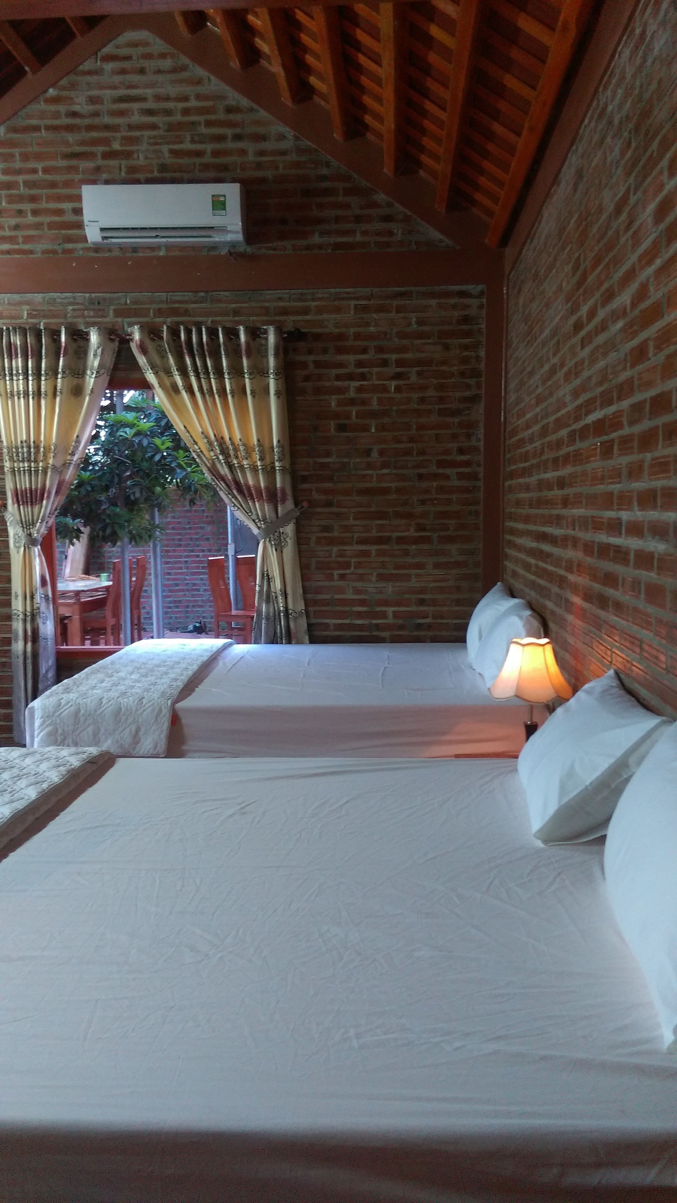 ファミリー 4 人部屋 1 ベッドルーム パティオ ガーデンビュー | 部屋からの景観