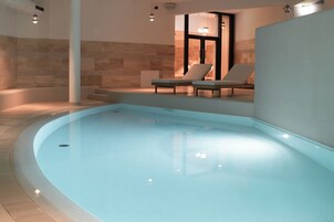 Indoor pool, open 7:00 AM to 10:00 PM, sun loungers