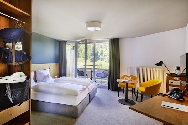 Deluxe Double Room | In-room safe, desk, cribs/infant beds, bed sheets