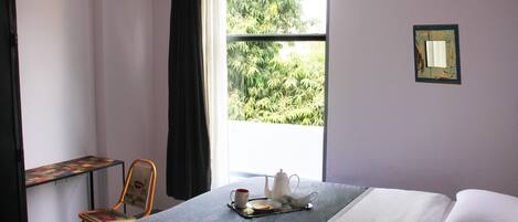 Desk, blackout curtains, soundproofing, iron/ironing board