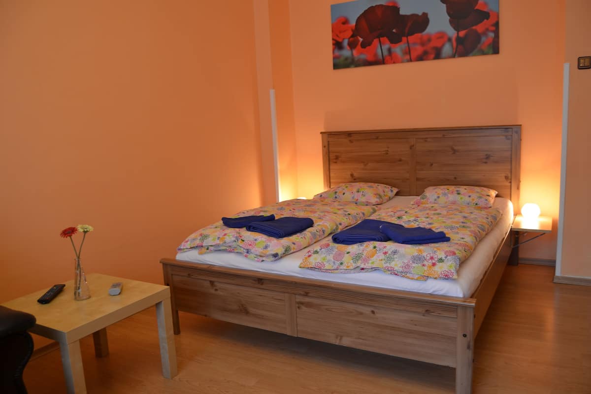 Apartment, 1 Bedroom | 1 bedroom, desk, laptop workspace, blackout curtains