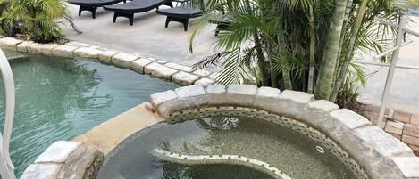 Outdoor pool, a heated pool, pool loungers