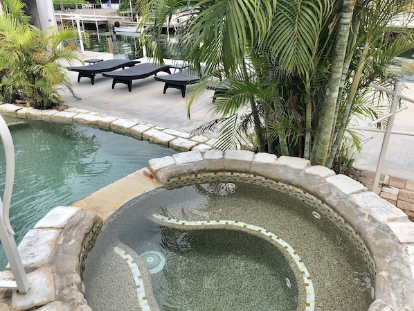 Outdoor pool, a heated pool, sun loungers