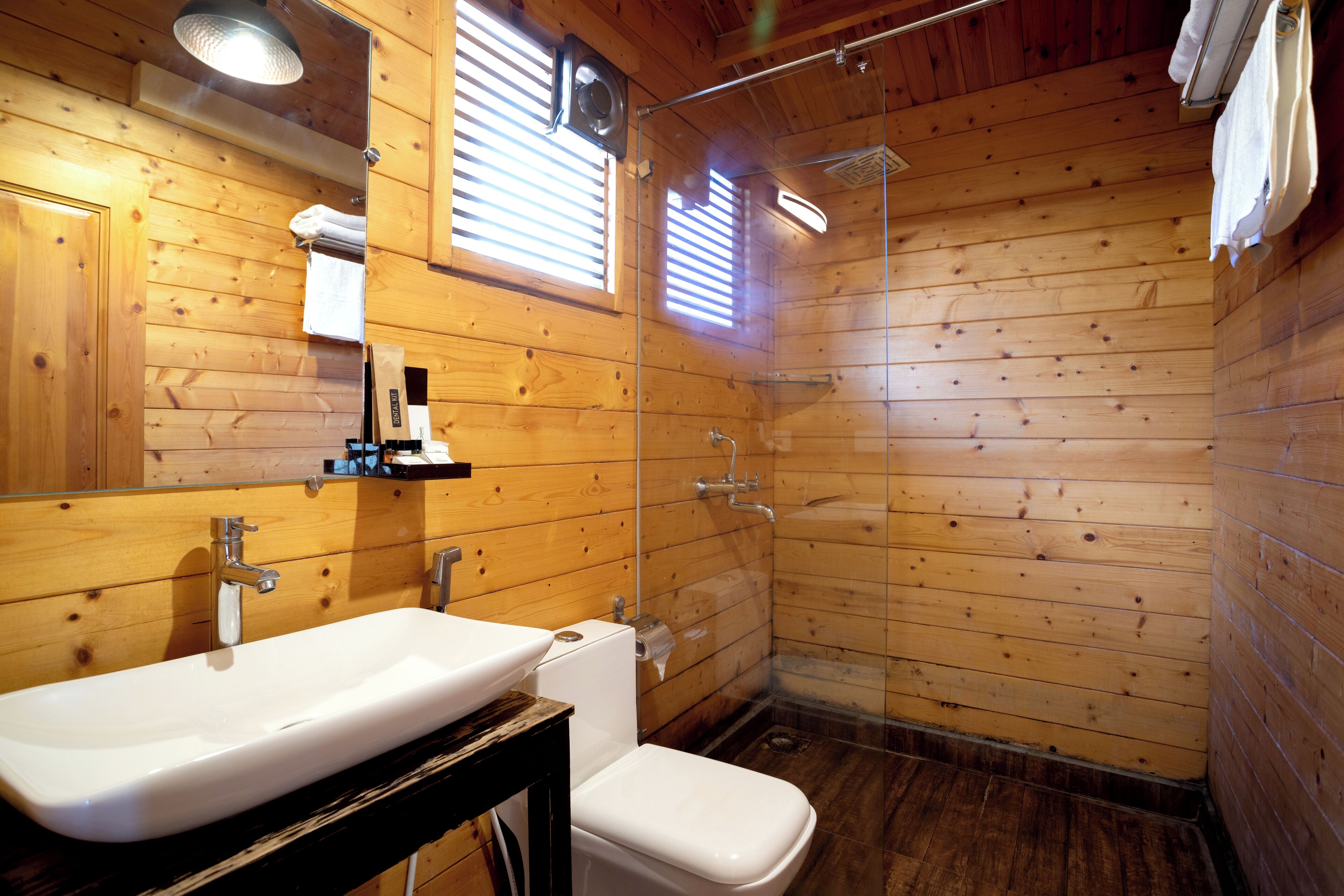 wooden cottage | bathroom | hair dryer, towels