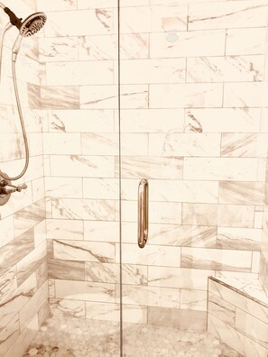 Combined shower/bathtub, hair dryer, towels, soap