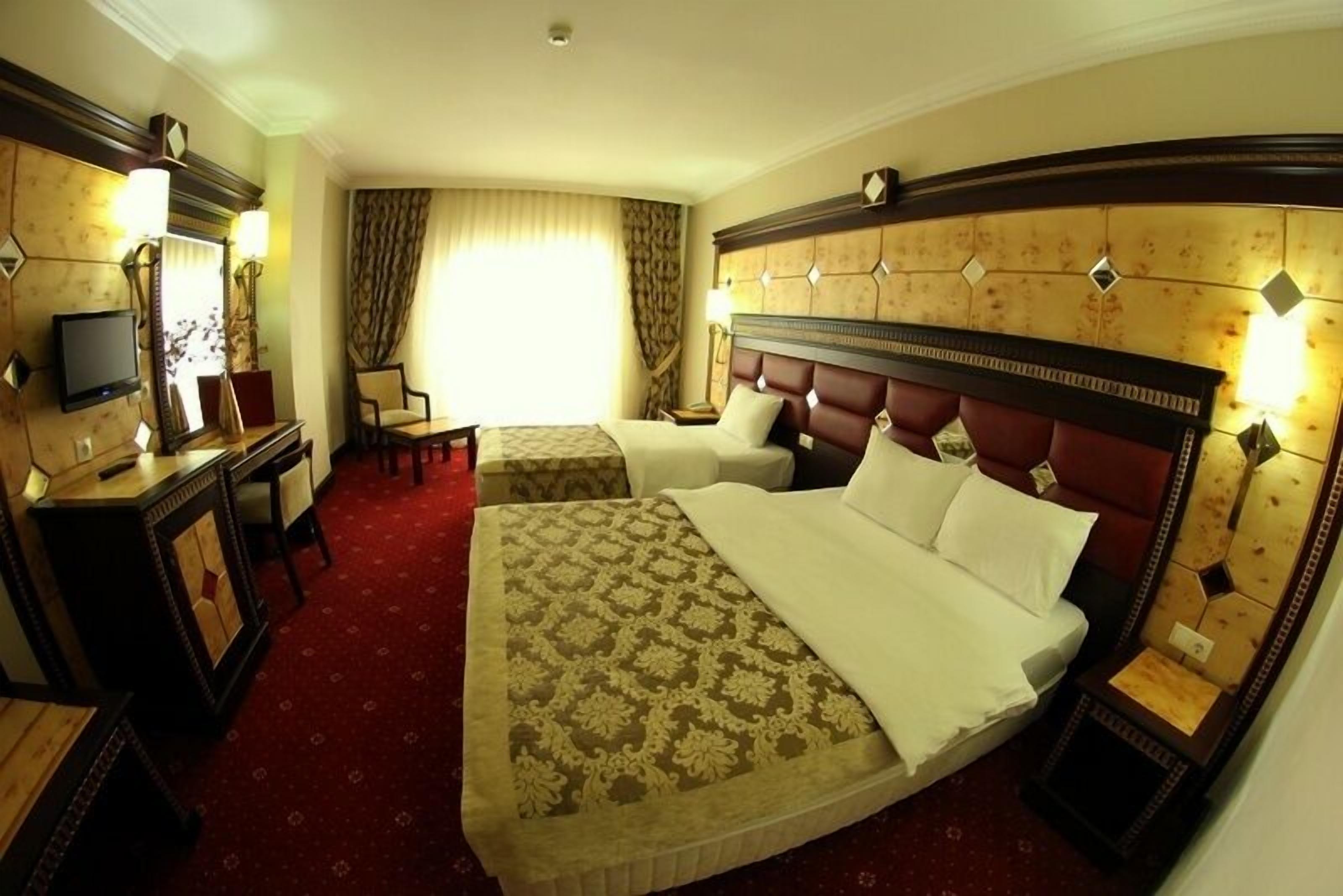 standard triple room, city view | minibar, in-room safe, desk, free wifi