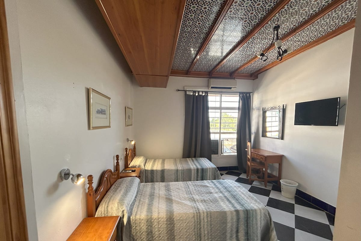 1 bedroom, desk, blackout drapes, iron/ironing board