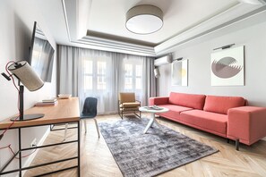 Apartamento superior (Leonardo Da Vinci) | Zona de estar | Una televisión de pantalla plana