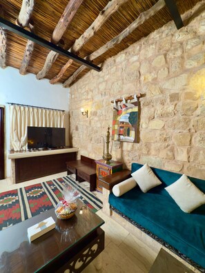 RST- Royal Suite | Living area | Flat-screen TV, pay movies, music library