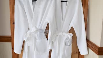 Deluxe Four-Poster Room, Sea View | Bathroom amenities | Free toiletries, hair dryer, towels